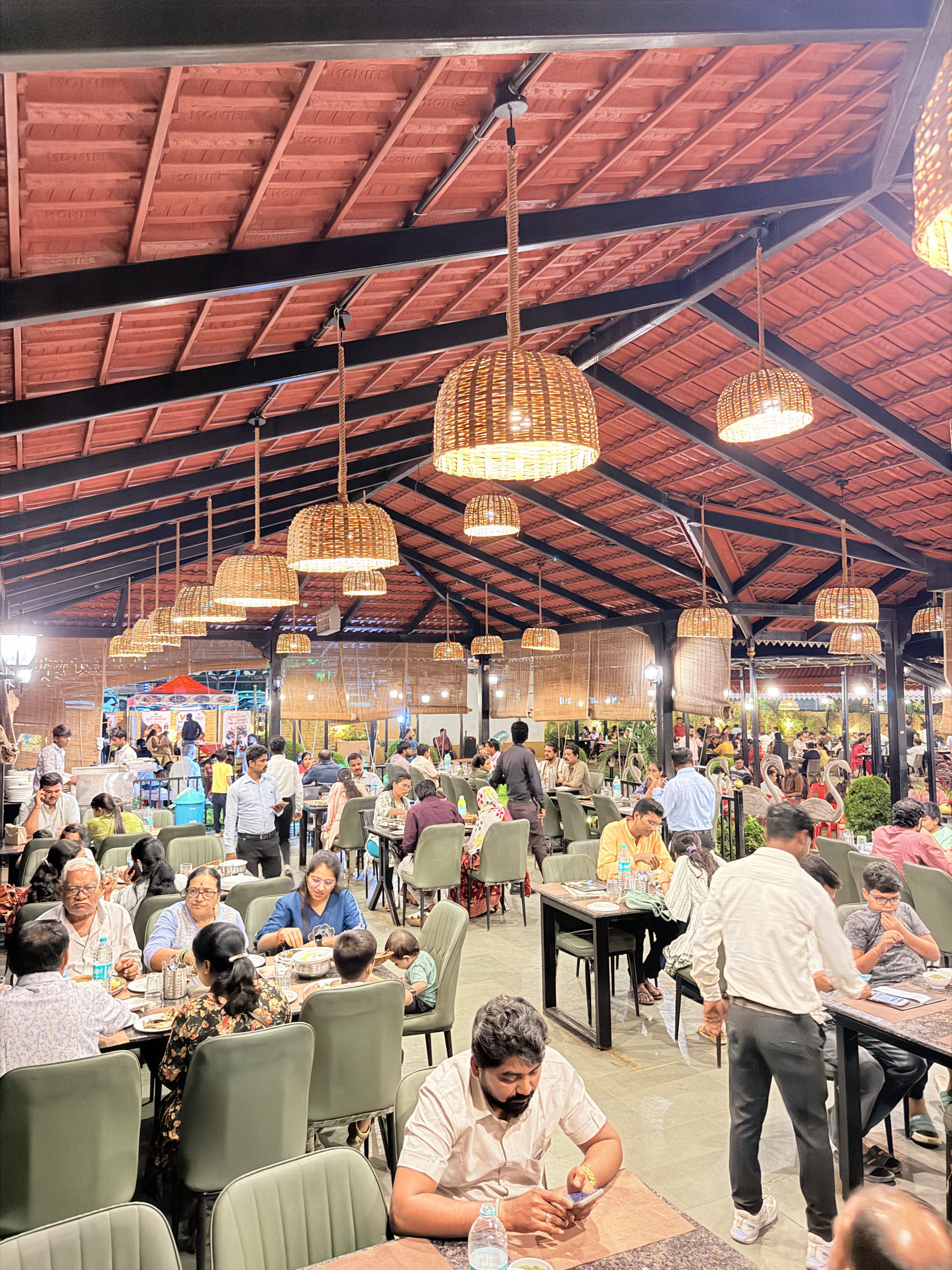 Restaurant interior with woven pendant lights