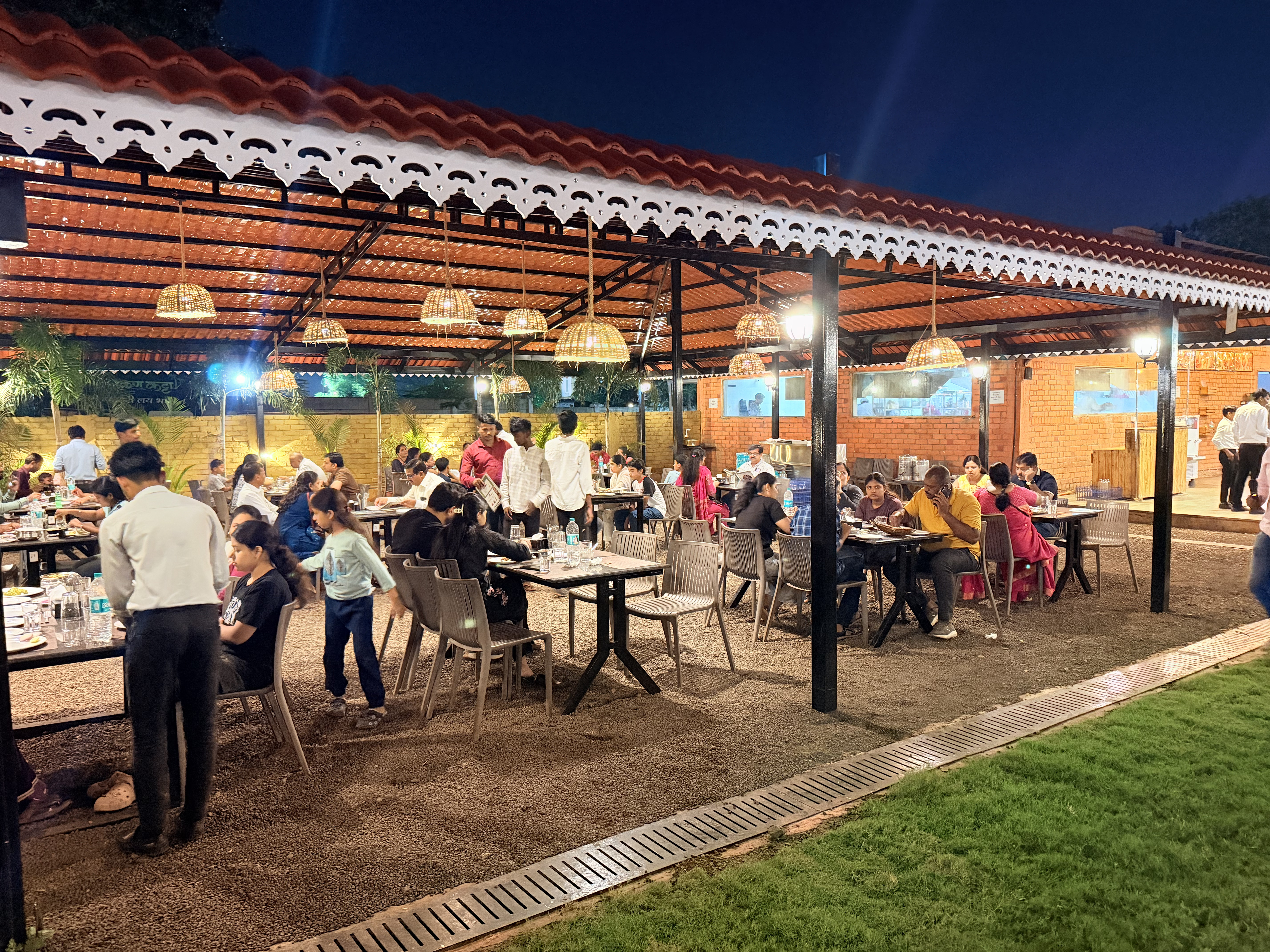 Guests dining in the outdoor restaurant area